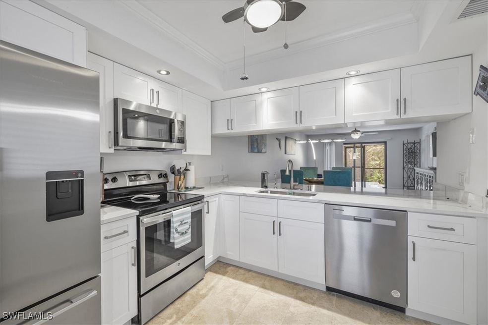 Kitchen featuring appliances with stainless steel