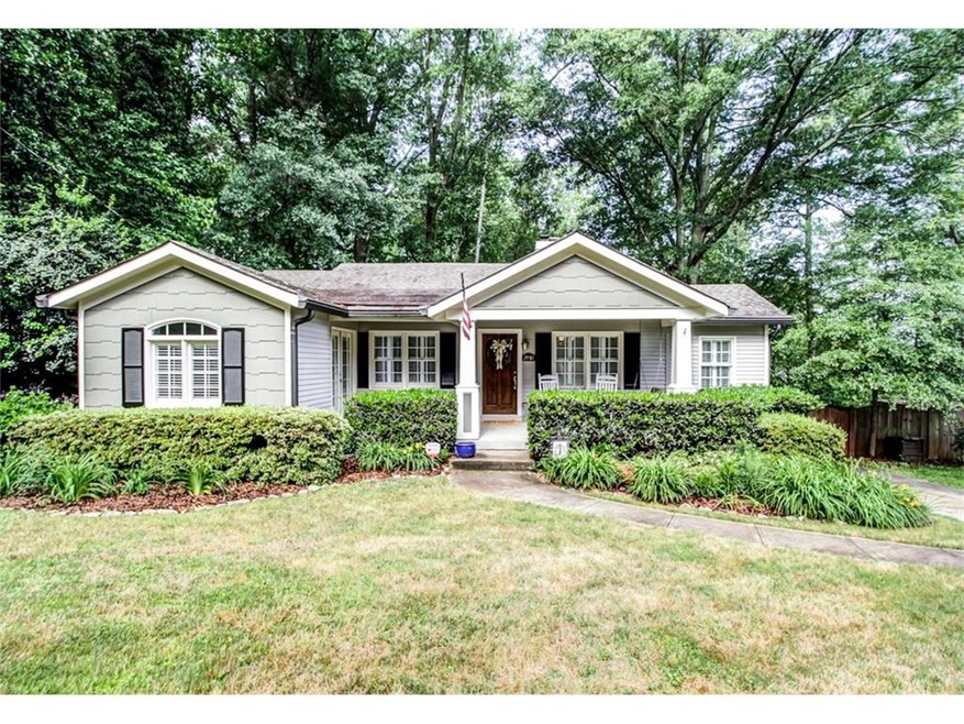 Picture perfect with rocking chair covered porch