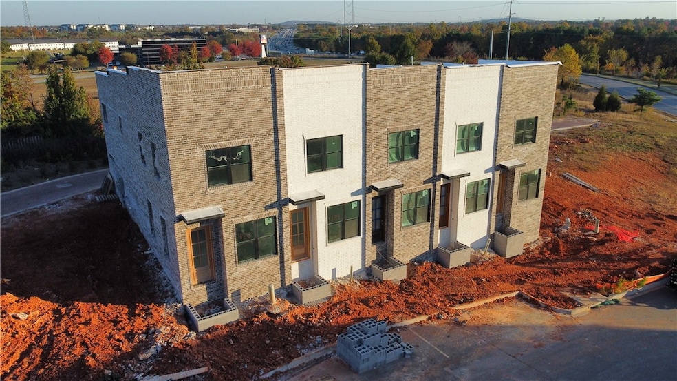 This building is still under construction. It is the 3 units on the right.