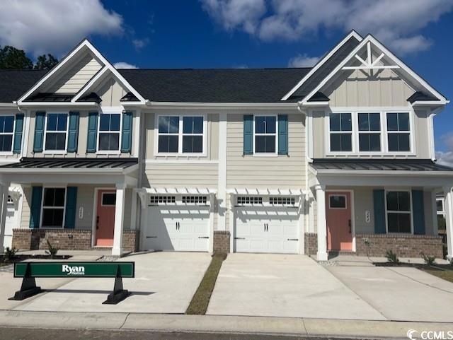 Craftsman inspired home featuring a garage