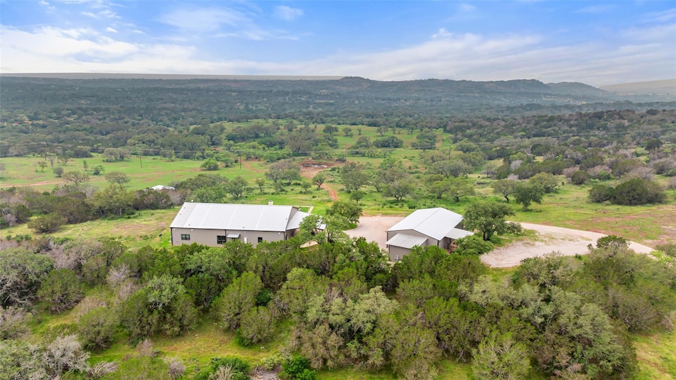 View from above of property with a mountain backd