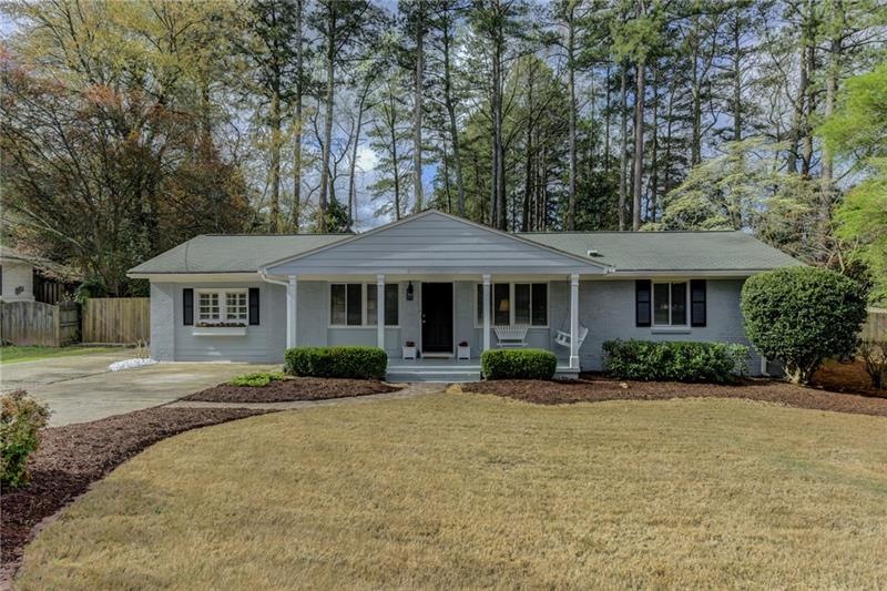 Adorable ranch with a lovely flat yard, front porc