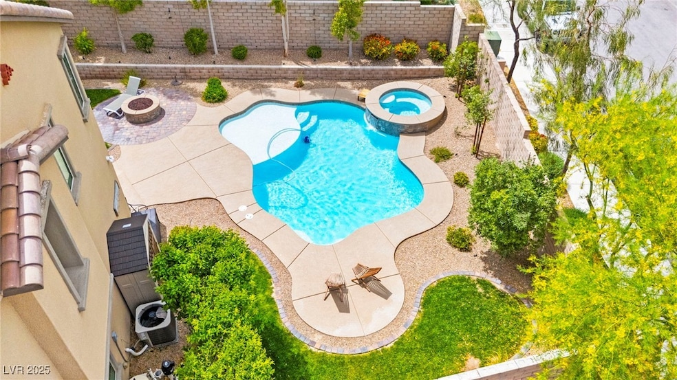 View of swimming pool featuring a patio area, cool