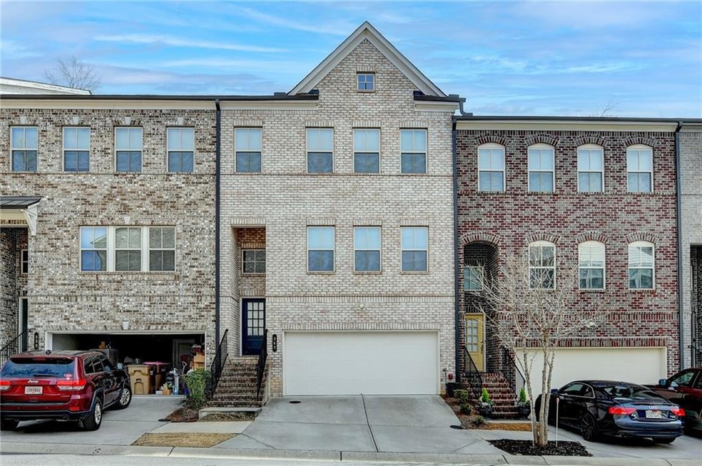 Townhome / multi-family property featuring concret