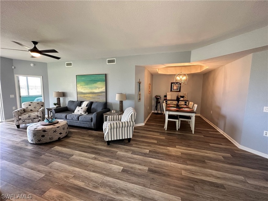 Family room and Dining room area with Tray Ceiling