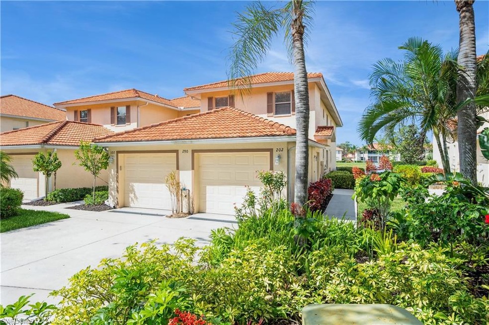 Mediterranean style home with a garage