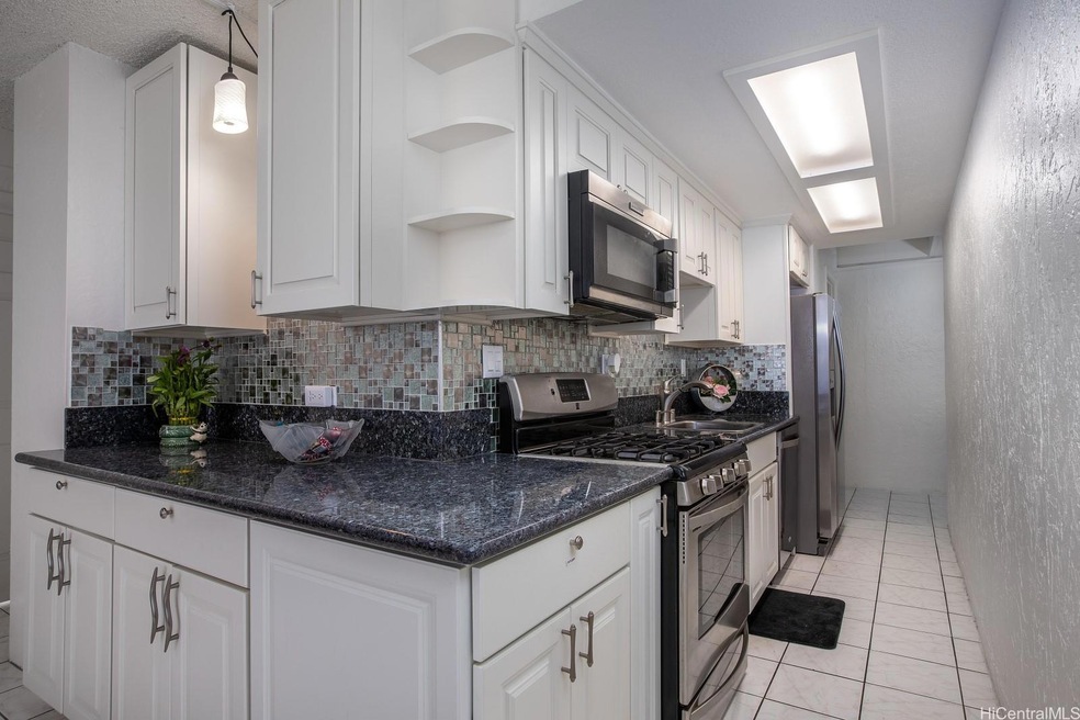 The kitchen is large with extra horizontal counter