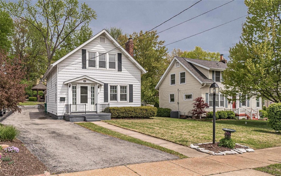 Welcome to 879 Providence Avenue in the lovely village setting of Tuxedo Park, one of the most cherished neighborhoods of Webster Groves.  The tree lined streets and the neighborhood show case of century homes make every walk a relaxing adventure.