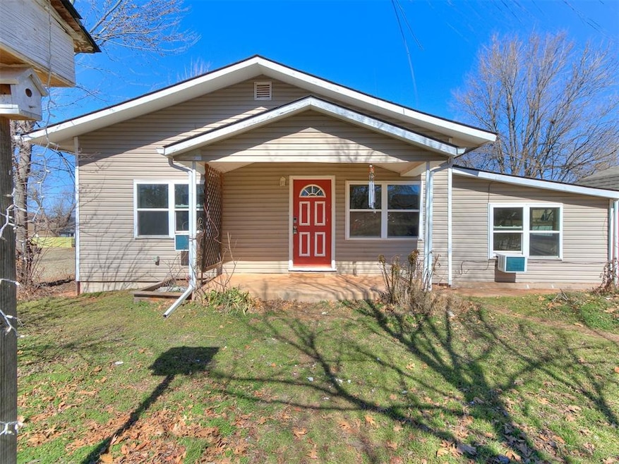 View of front facade featuring covered porch and a