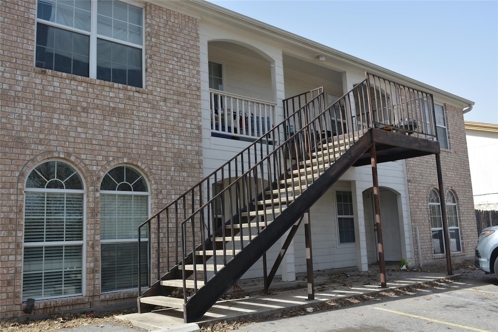 View of building exterior featuring stairway