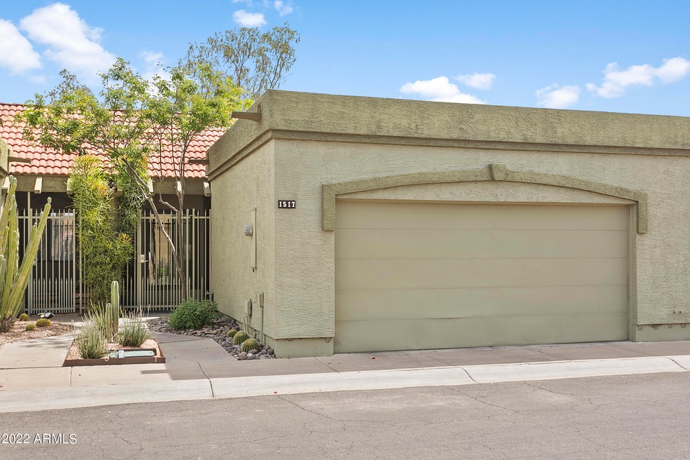 Front of unit with 2 car garage