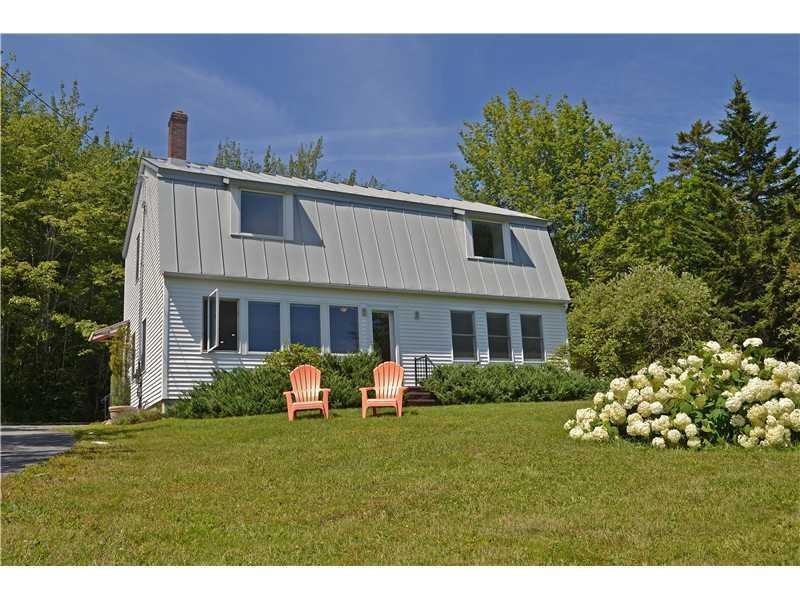 Exterior Front. This gambrel-style,...