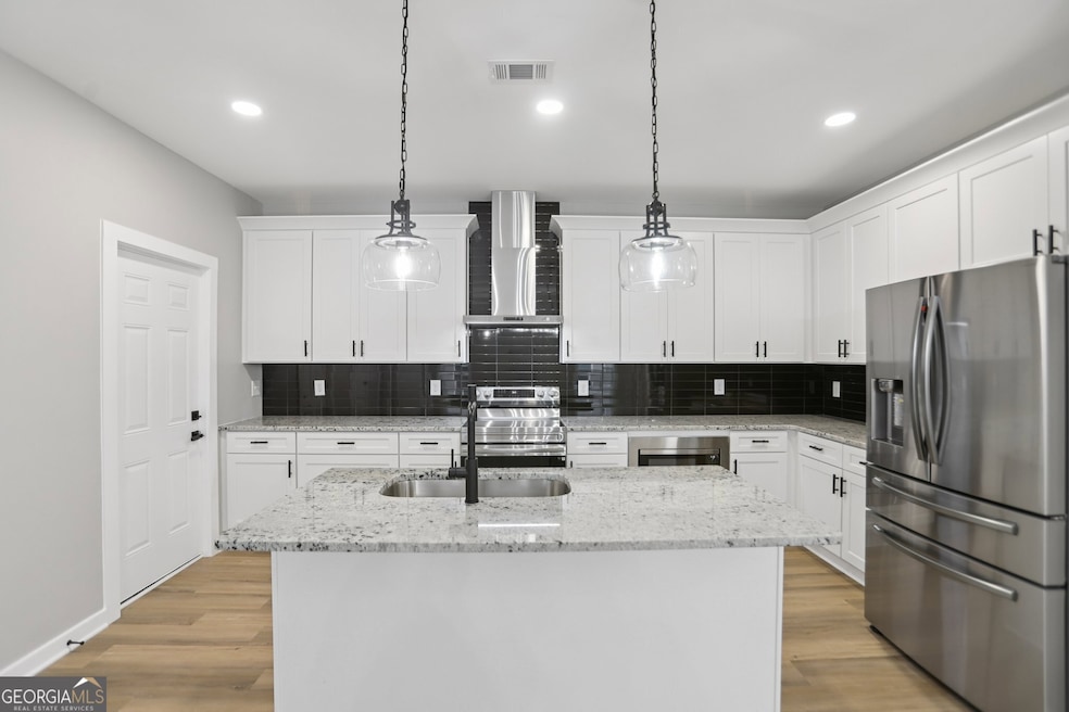 Large Chef's Kitchen, spacious Island, Stainless Steel Appliance package, Granite Counters, & more