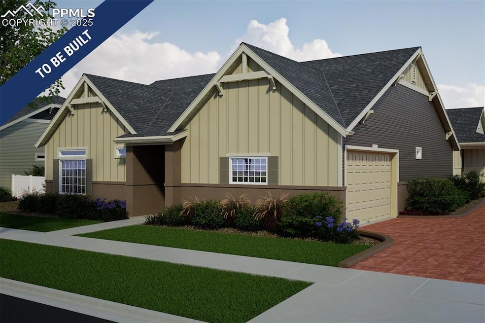 View of front of home with an attached garage, dec