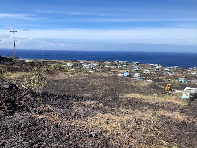 Looking from top of driveway across pad to southwest.