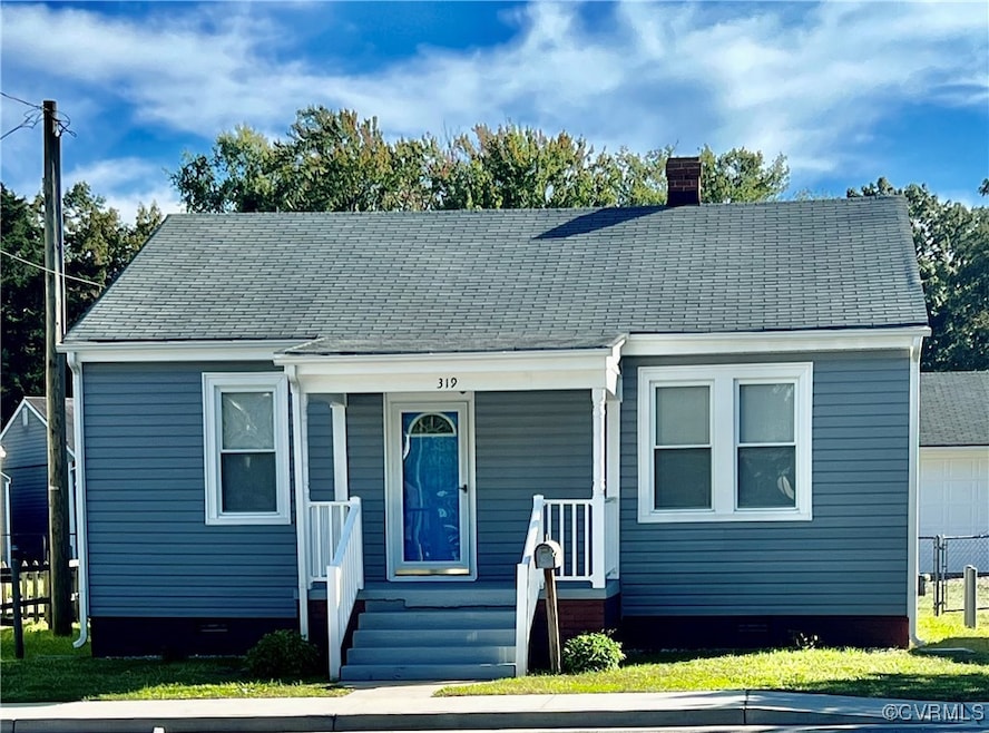 View of front of home featuring a front yard