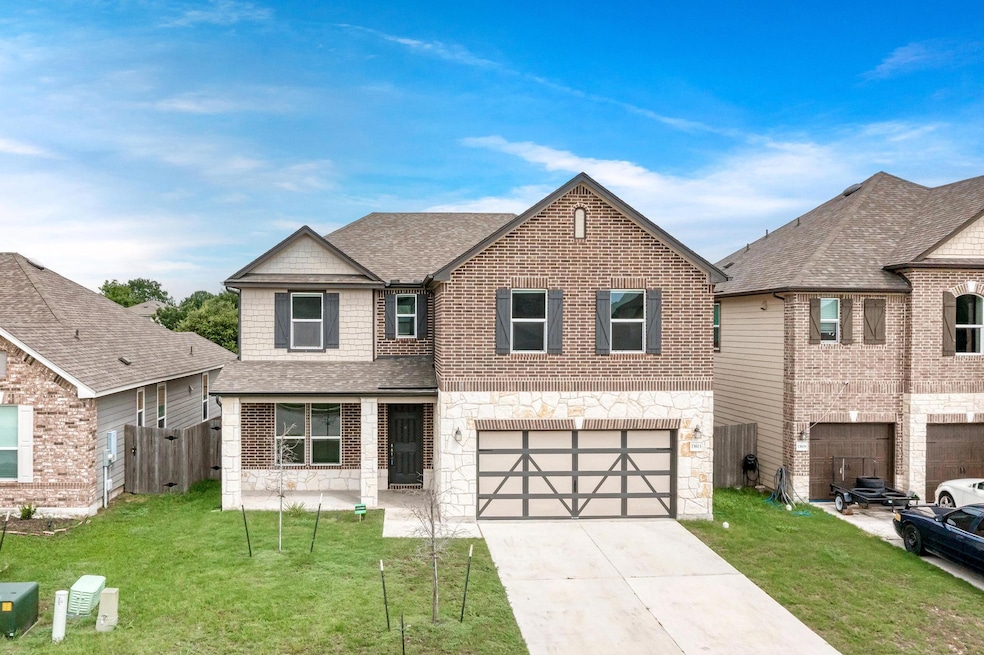 View of front facade featuring a shingled roof, d