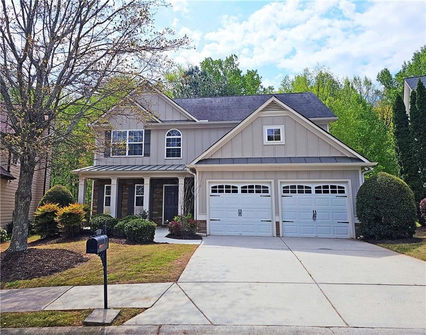 View of front of home with a garage