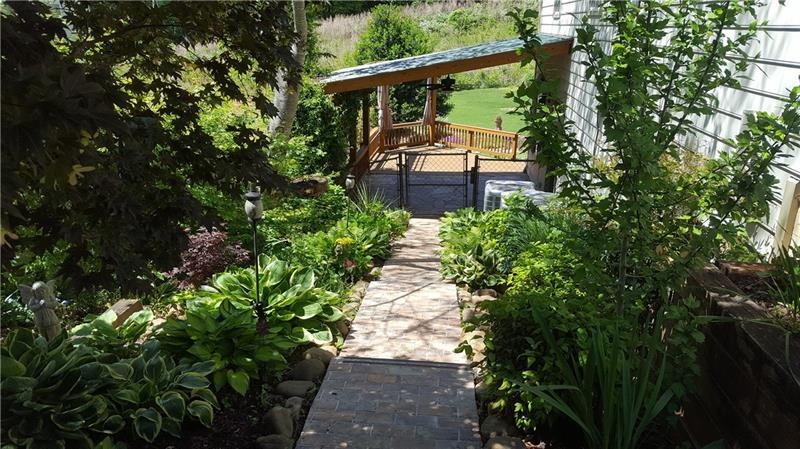 SIde garden is full of returning perennials - This