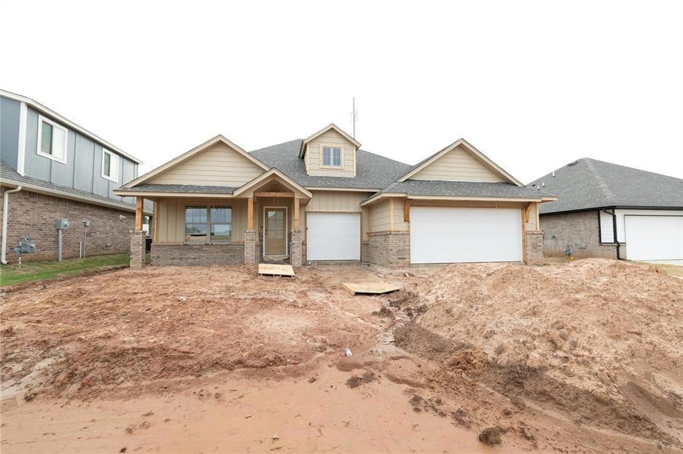 Kitchen featuring built in microwave, stainless steel oven, light wood-style floors, light countertops, and a sink