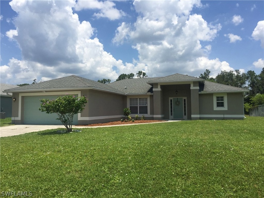 128 Ridgemont Dr, Lehigh Acres, FL 33972 - photo 1