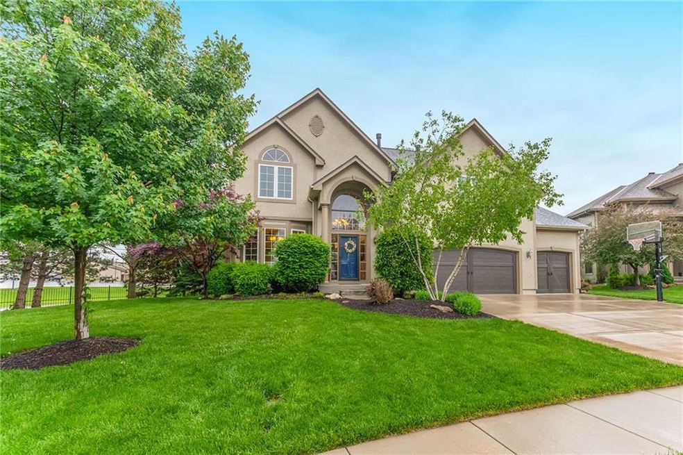 Approach the home at the end of a treed cul-de-sac