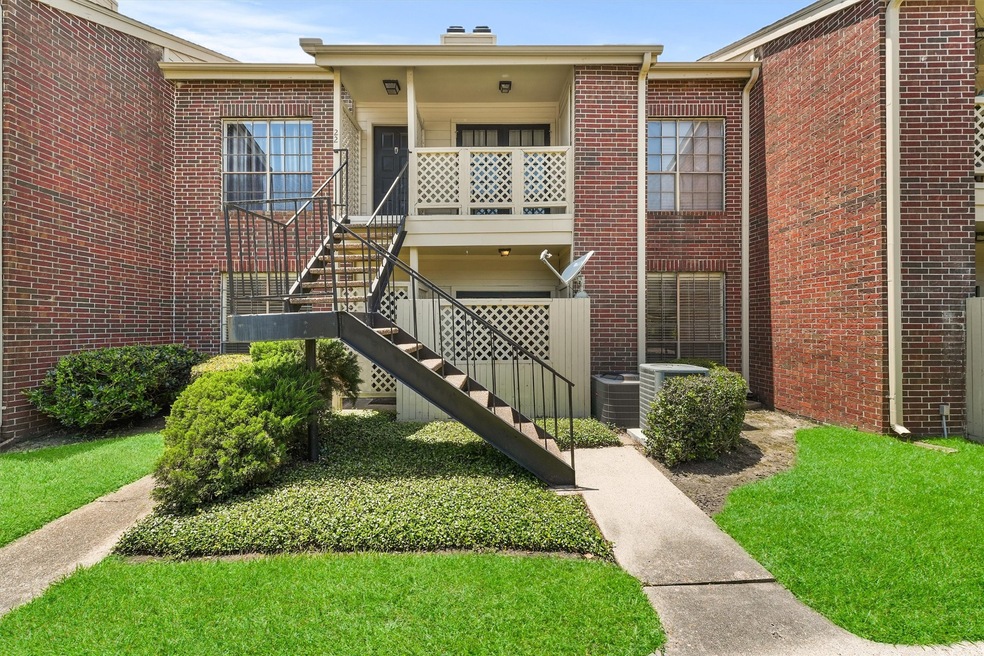 Welcome home to this charming ground-level condo w