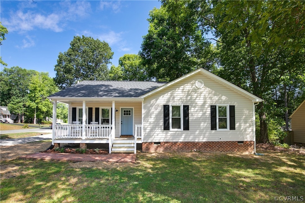 Single story home featuring a porch and a front la