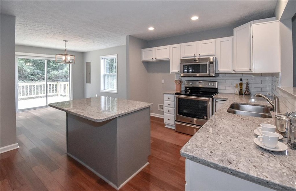 Spacious and well appointed kitchen and island for