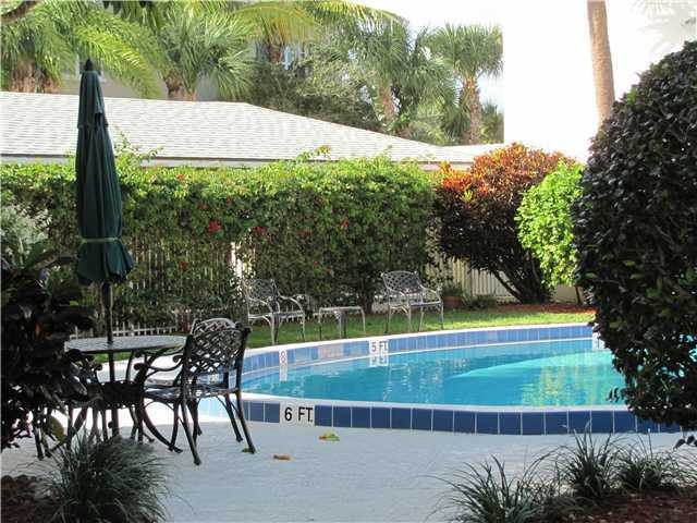 Exterior Front. Pool steps from the door