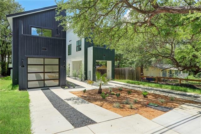 Front yard features a combination of draught-toler