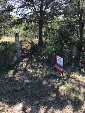 Entrance to property, post on left is start of fro