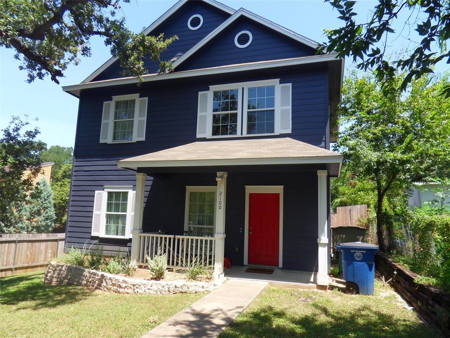 View of front facade featuring a porch and a shin