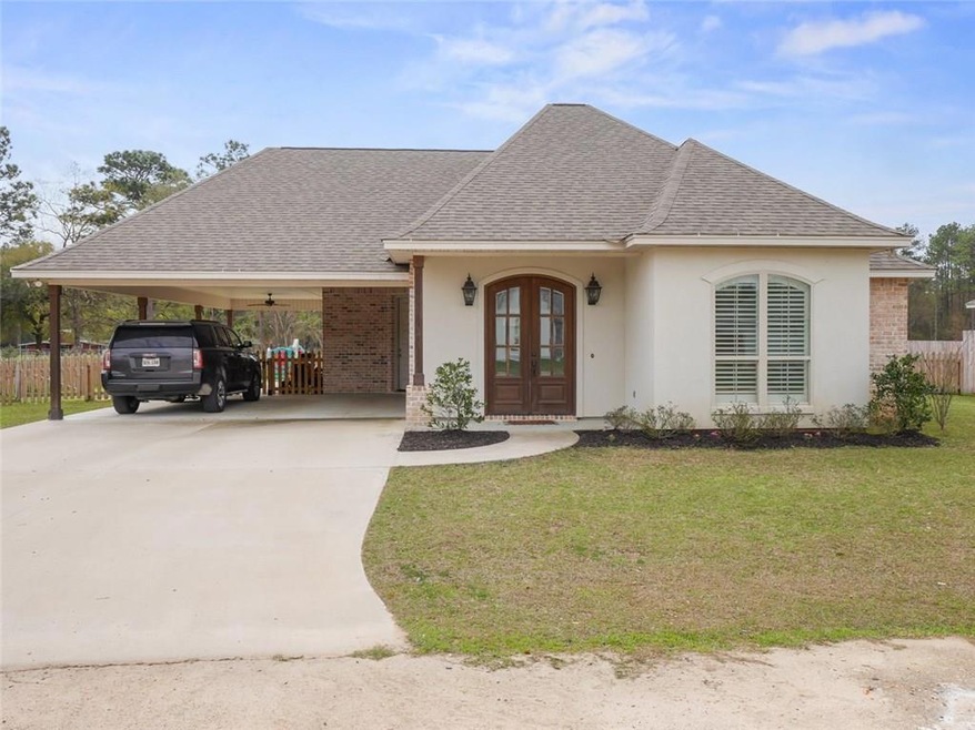 Front view of this all brick & stucco home.