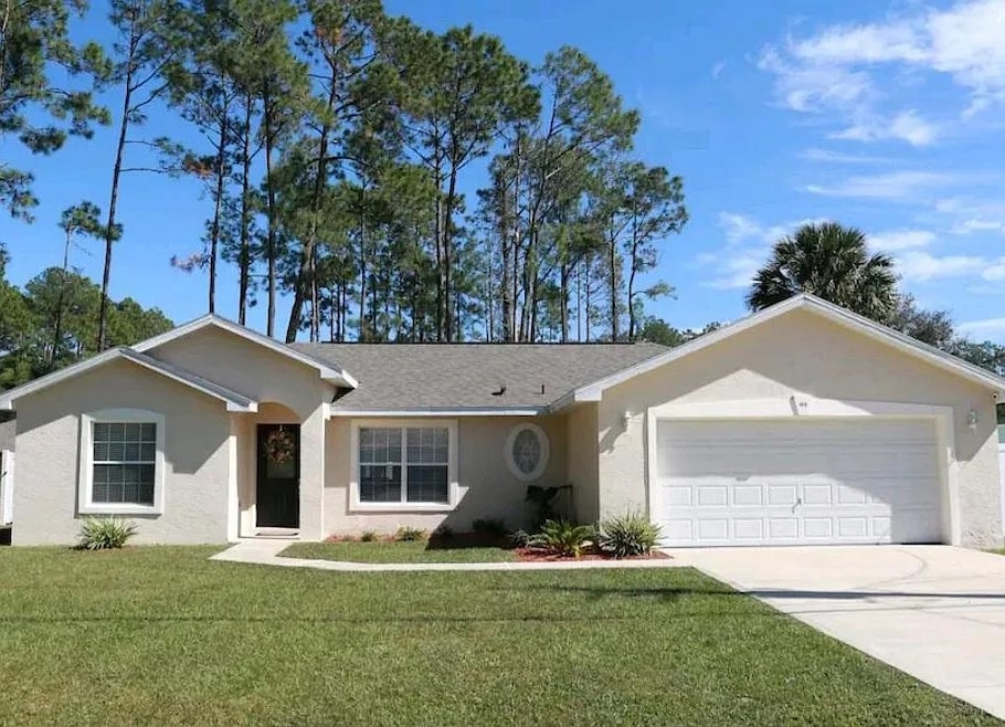 99 Rickenbacker Dr, Palm Coast, FL 32164 - photo 1