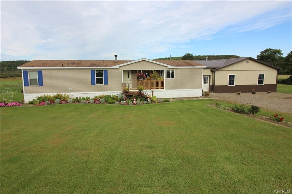 Beautiful gardens surround this entire home with l