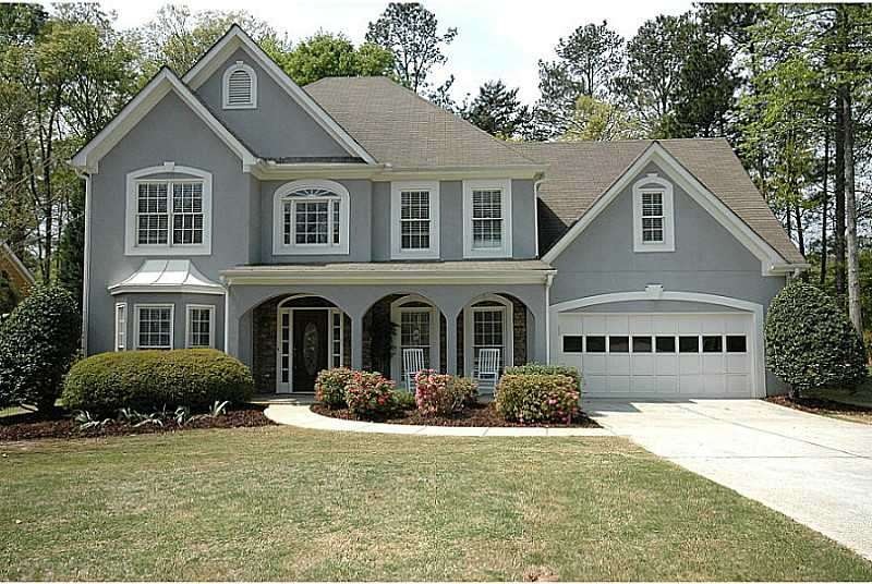 Exterior Front. Hardcoat Stucco, Rocking Chair Fro