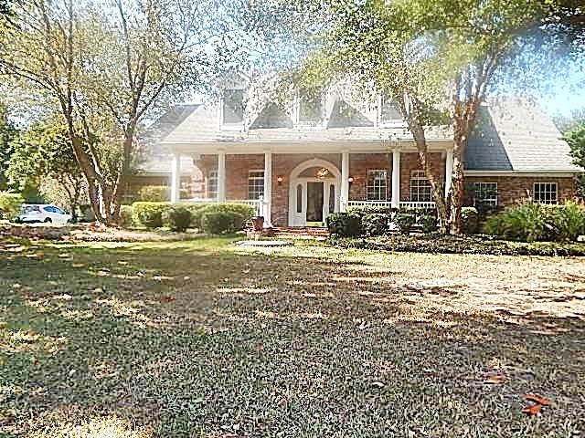 Plantation style home sitting on 3 acres