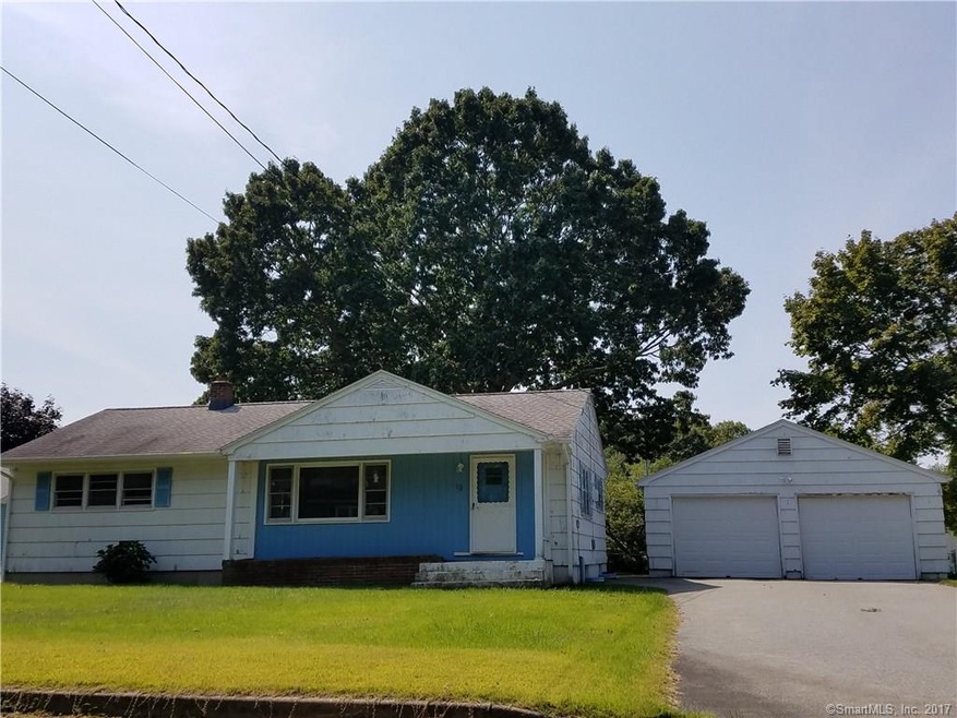 Street view.  House to be sided with NEW windows i