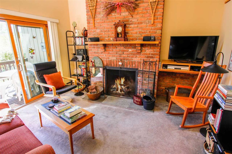 Vaulted ceilings, fireplace, new sliders to deck