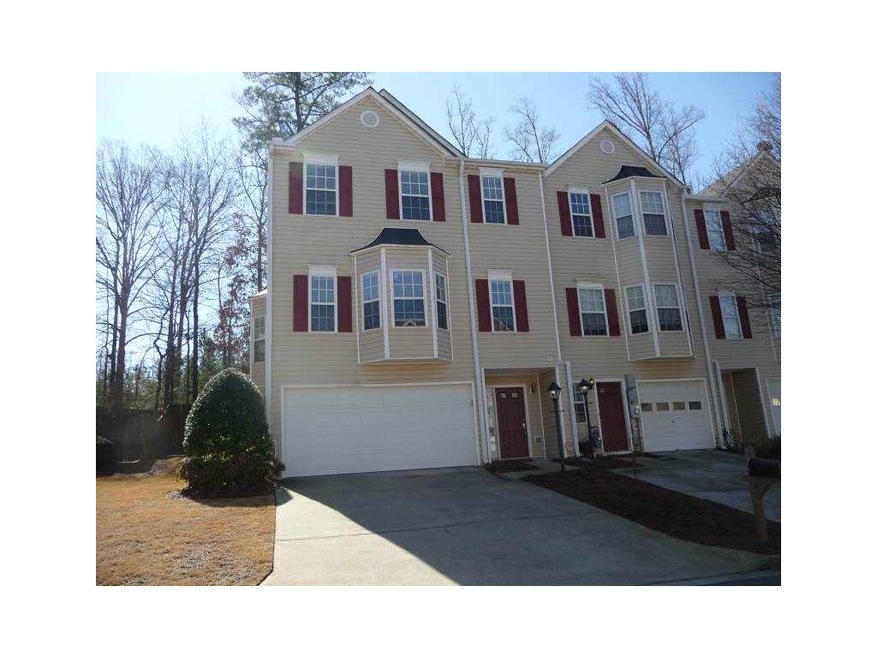Exterior Front. Elegant end unit townhome.