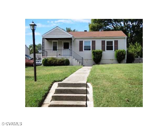 Exterior Front - This charming rancher says welcom