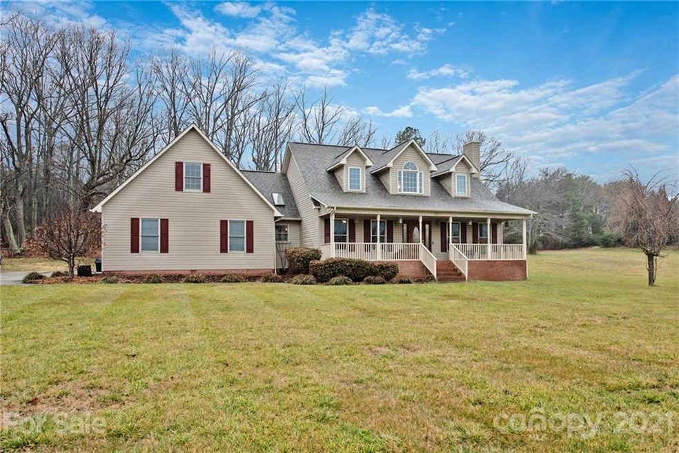  Beautiful Cape Cod style home on almost .75 acre lot!