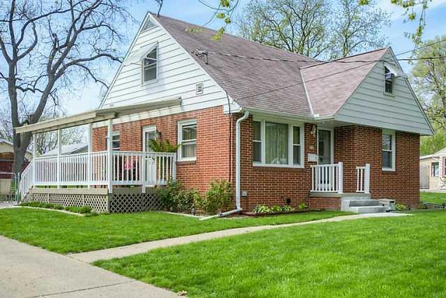 Exterior Front. Lovely Brick 1 1/2 story home.  We