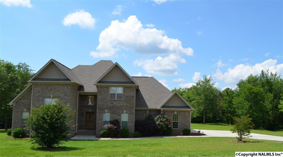 1.67 Acre property located on a bluff.  Full Brick Home Built in 2011 with 3179 sf. Top of Grant Mountain in Iris Estates