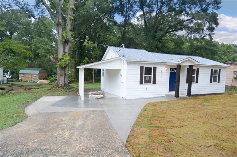 1 Attached Covered Carport with additional parking