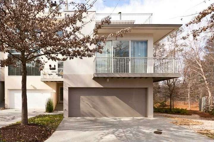 Exterior Front. 2 Car Garage, 2 Decks, Rooftop Ter