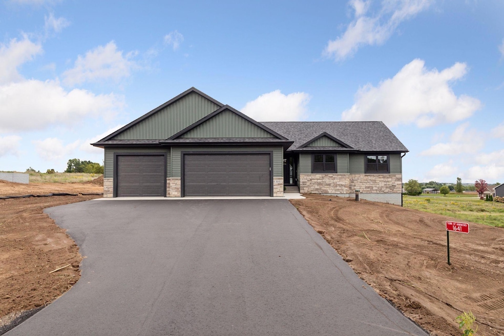 Photos are of a previously completed home with similar design and features. Actual selections, finishes, and materials may vary based on buyer choices and availability.