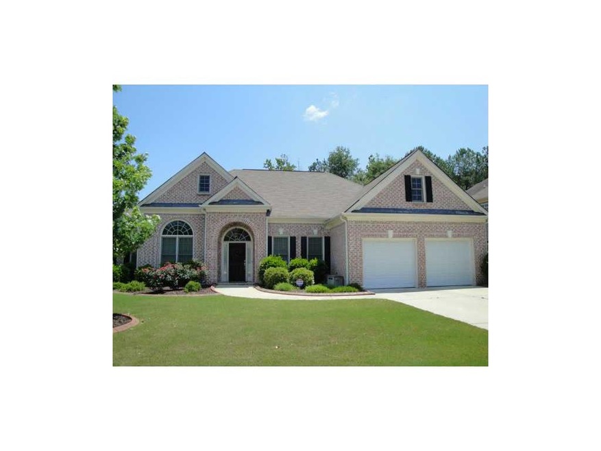 Exterior Front. 3 Sided Brick Ranch with Upper Lev