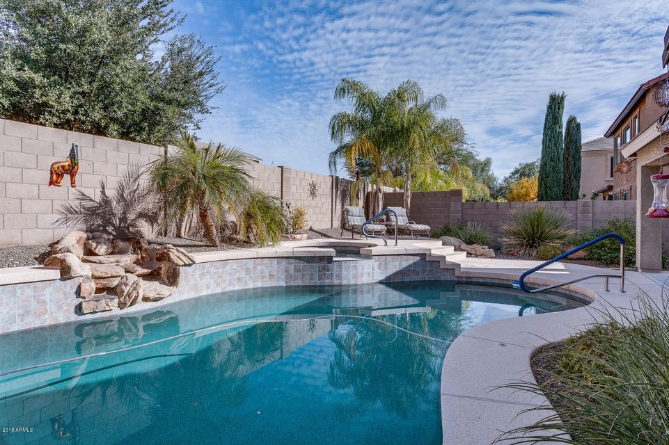 Pool with in-ground hot tub.